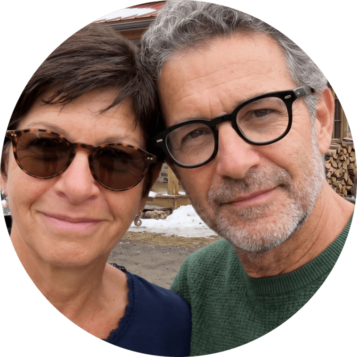 A person on a cozy studio smiling