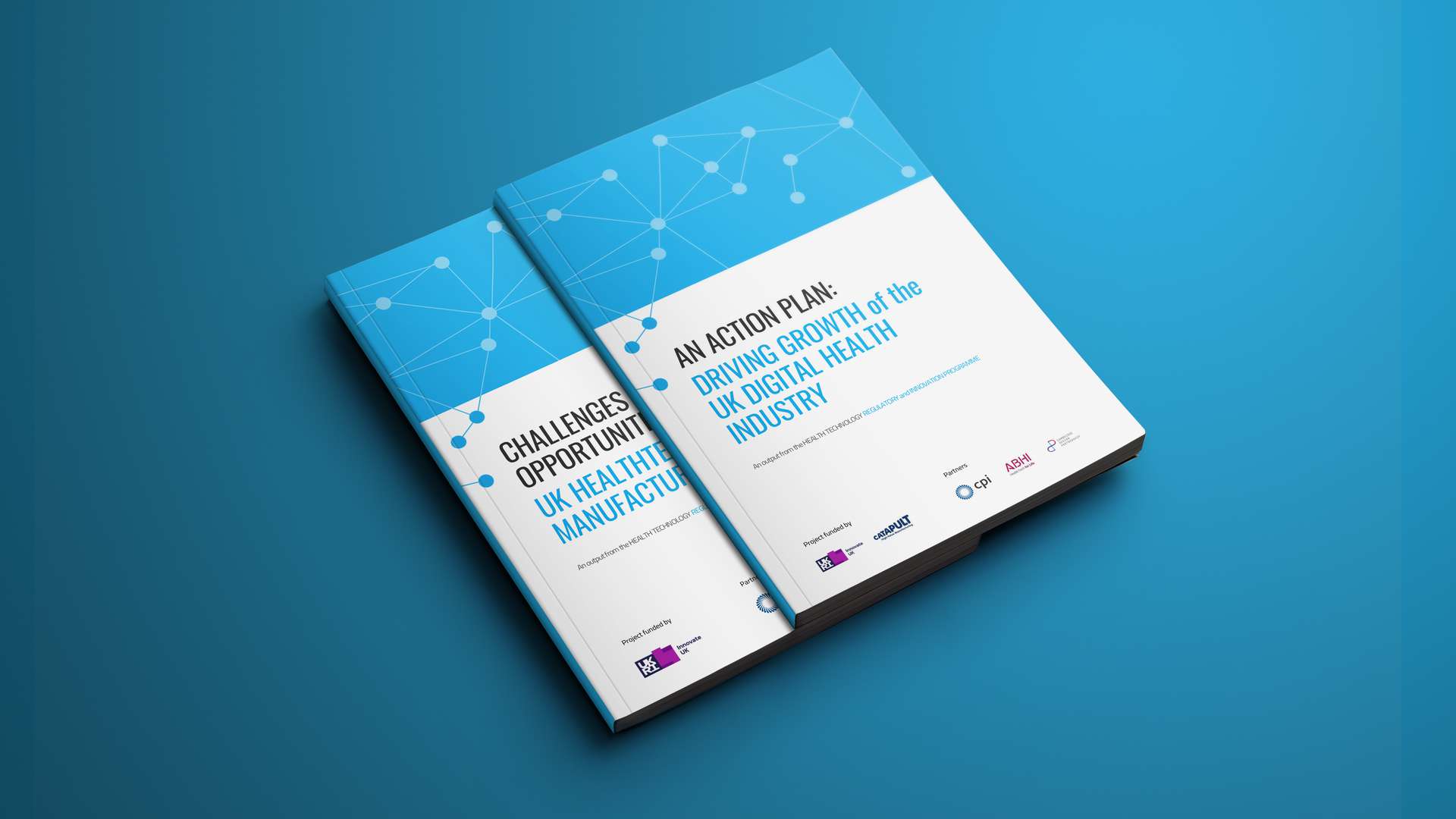 Two printed CPI HealthTech report booklets on a blue background, titled about growing the UK digital health industry
