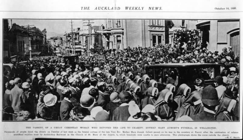 Historic crowd outside a building