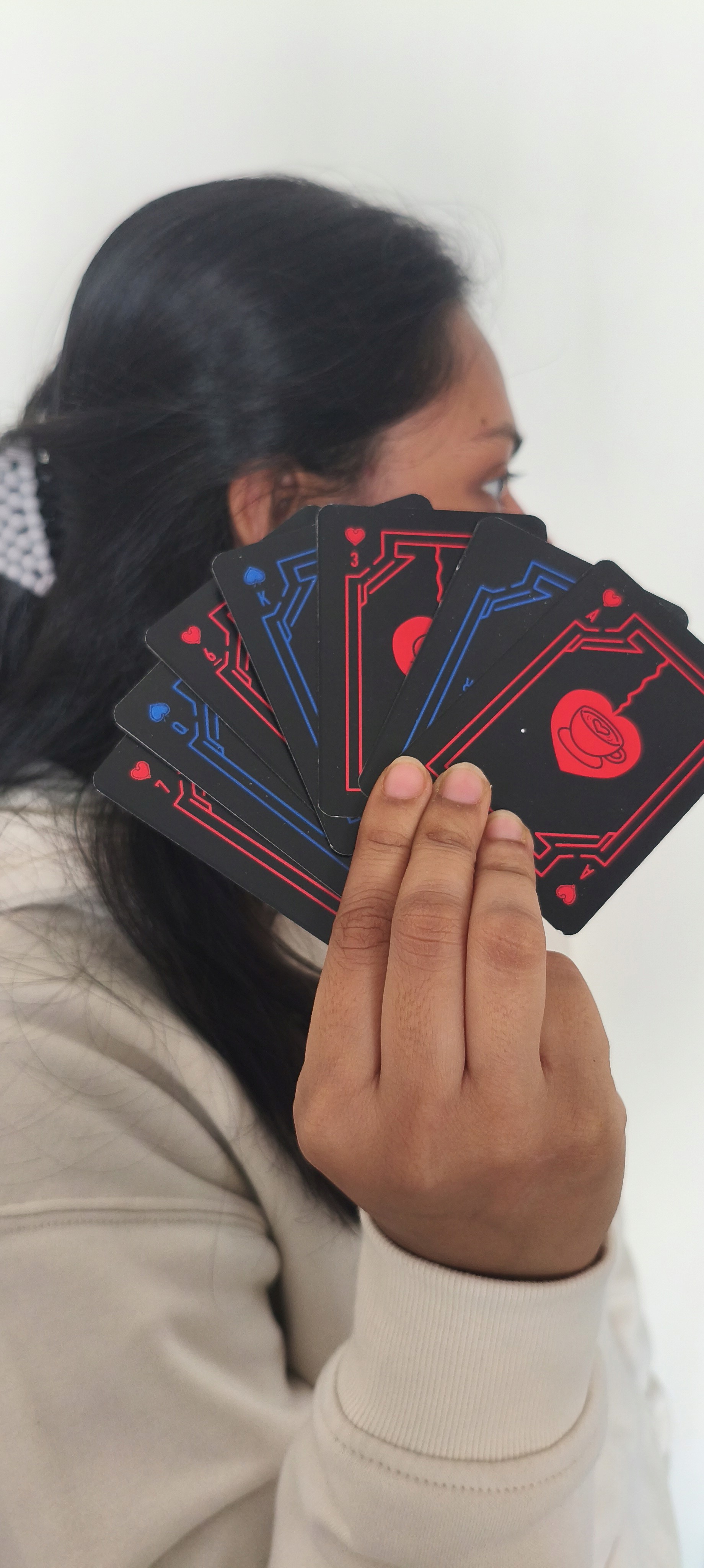 a woman holding a red flower