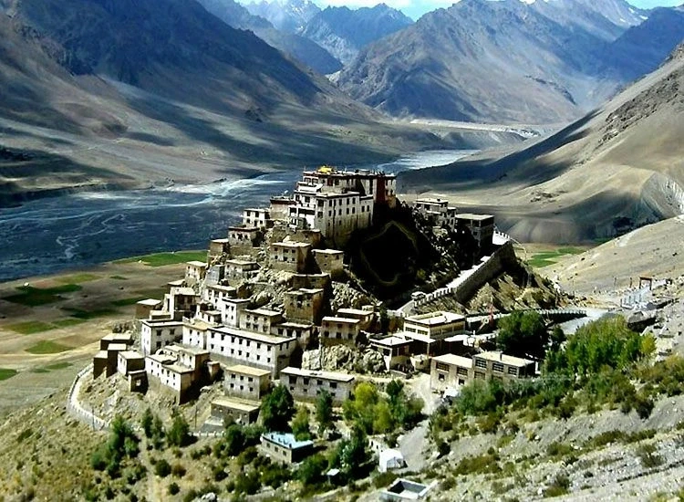 Cliffside monastery in valley