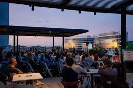 a black and white living room with a large tv