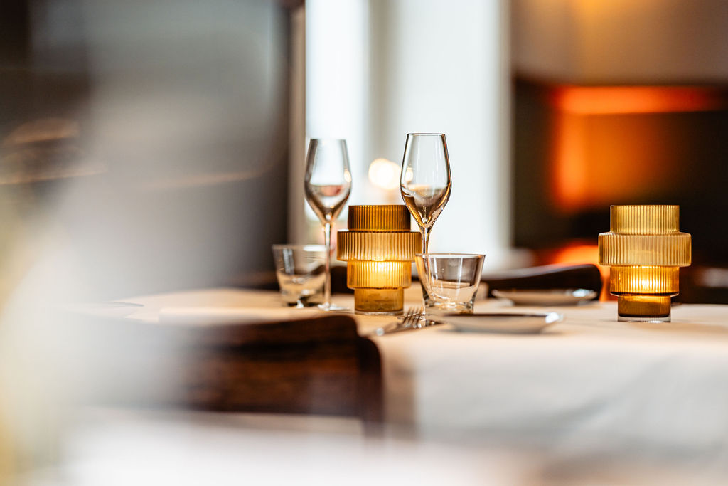 luxury restauarant interior in blue colors with large chandelier