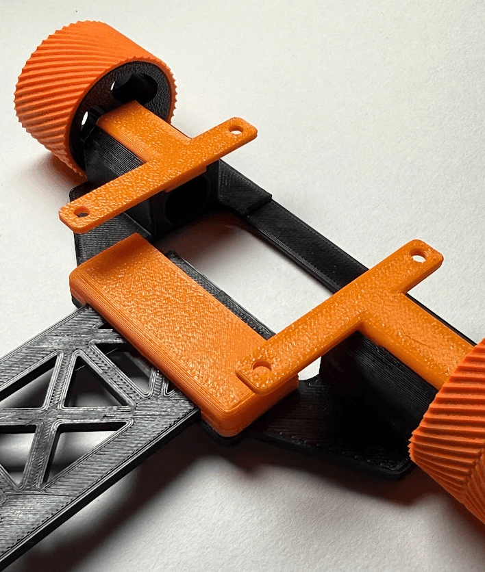 Basic LFR chassis top view – PCB tray, sensor arm slot and N20 motor mount positions