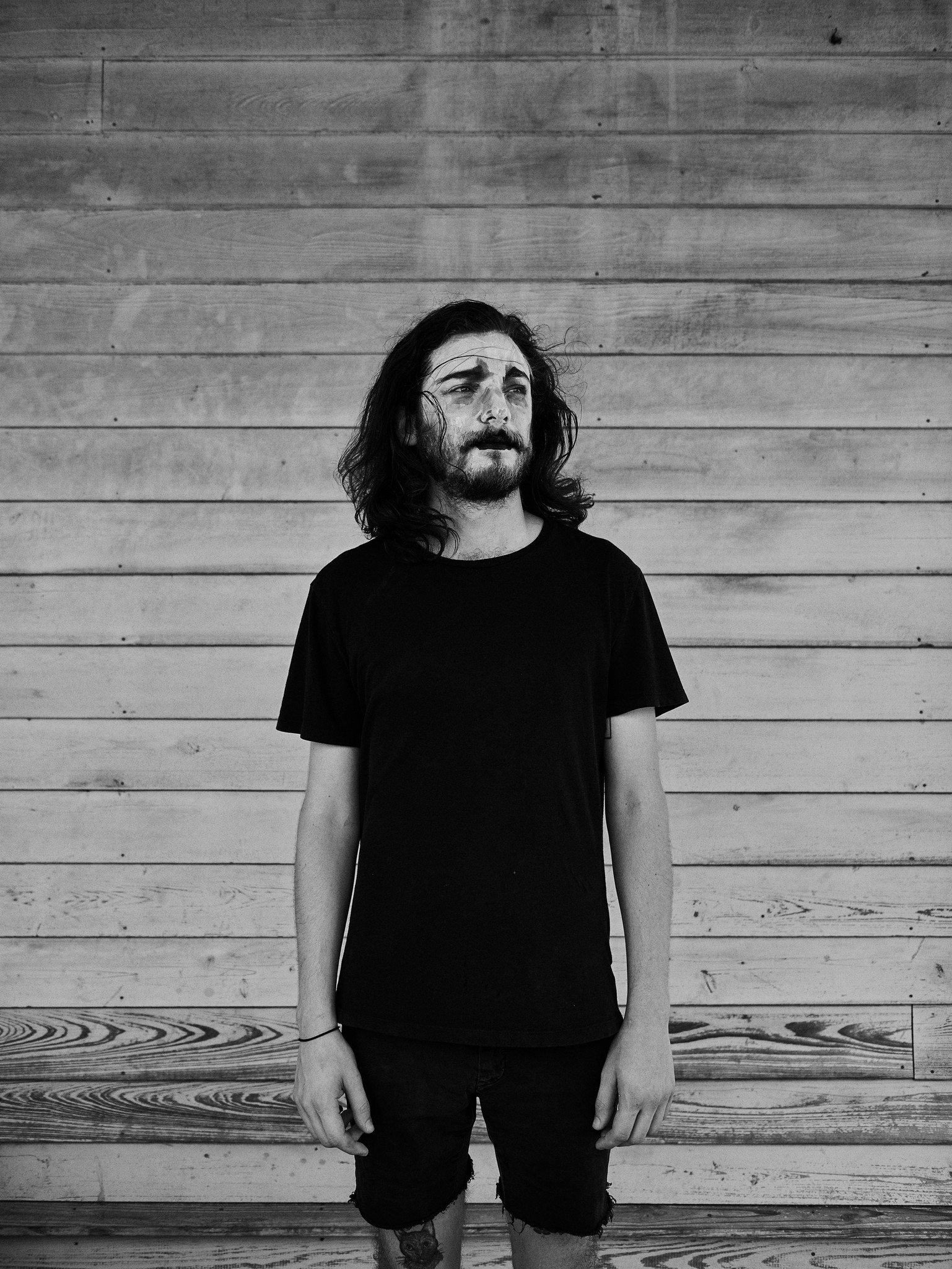 Black and white portraits of young alternative, romantic, goth, freak, punk and metal character against a textured New Orleans backdrop. 