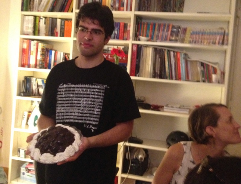 student holding a pie