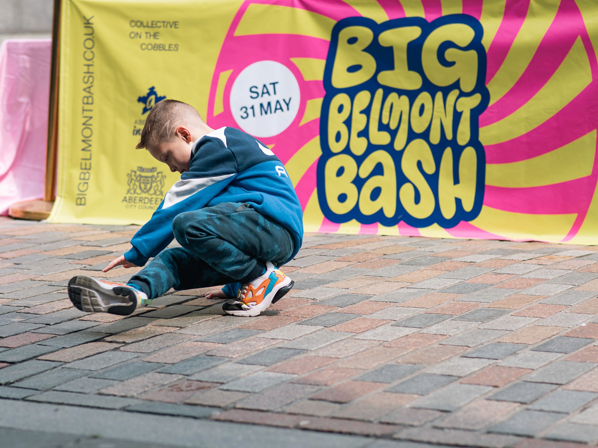 Boy breakdancing in the street
