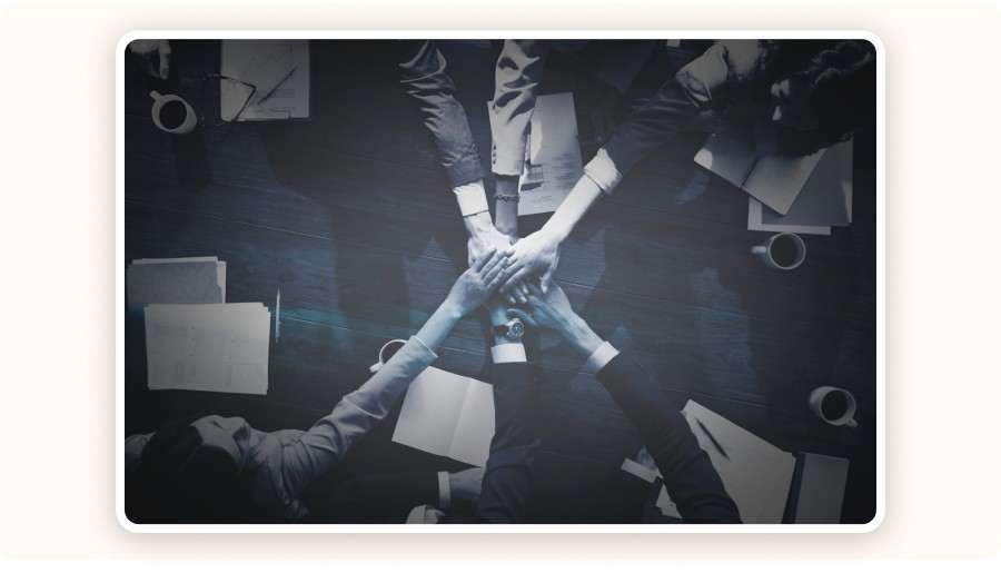 Top-down view of a team in a meeting