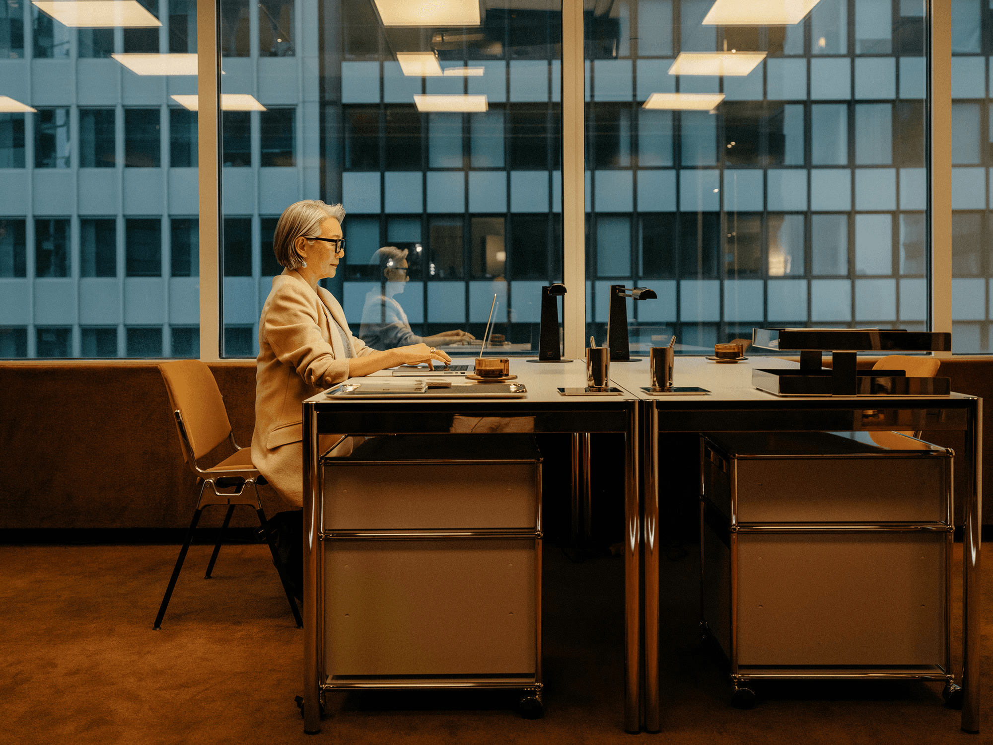 happy woman working on laptop and smiling