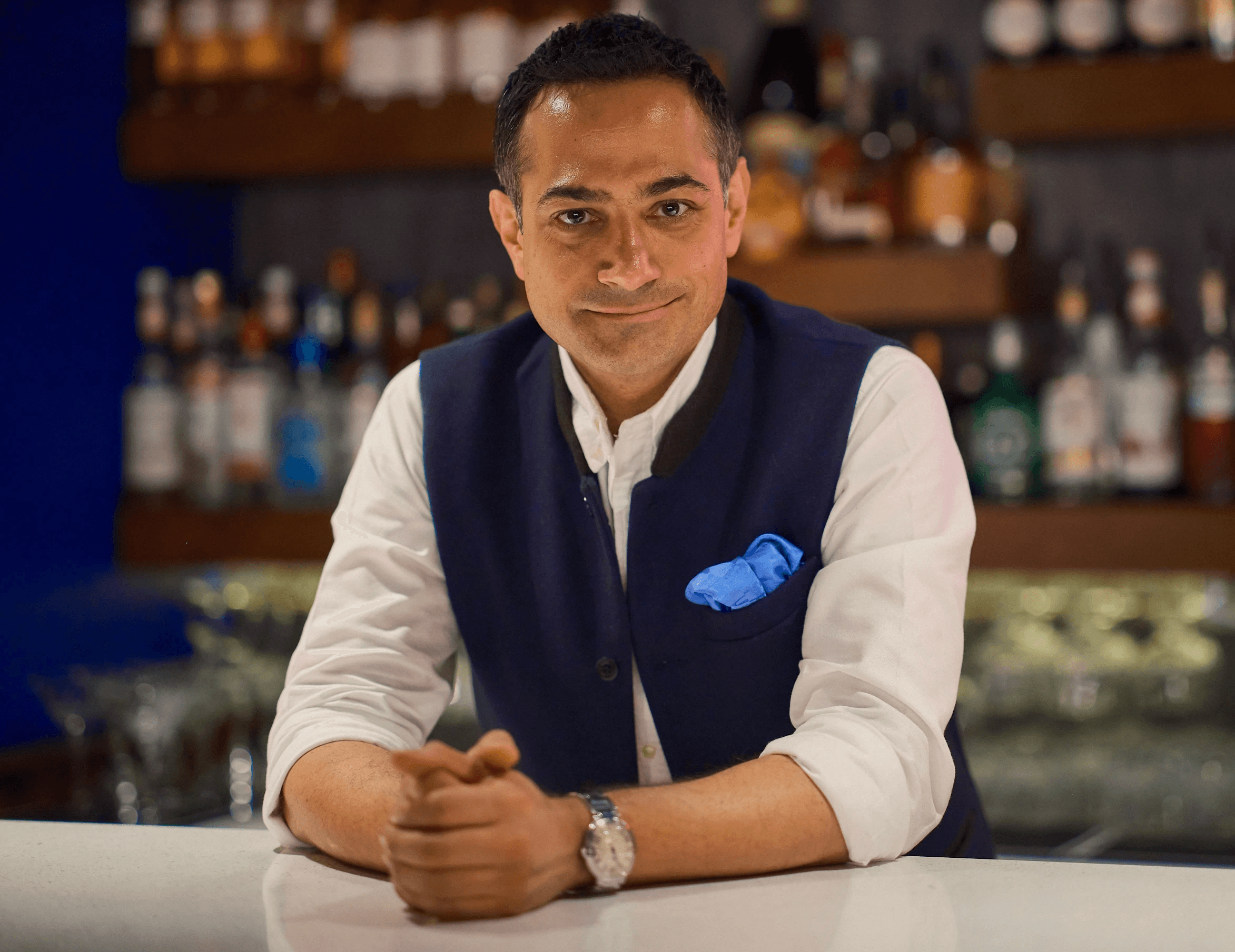 an interior of a fine dining restaurant with focused shot on the table with the plates and glass has been served