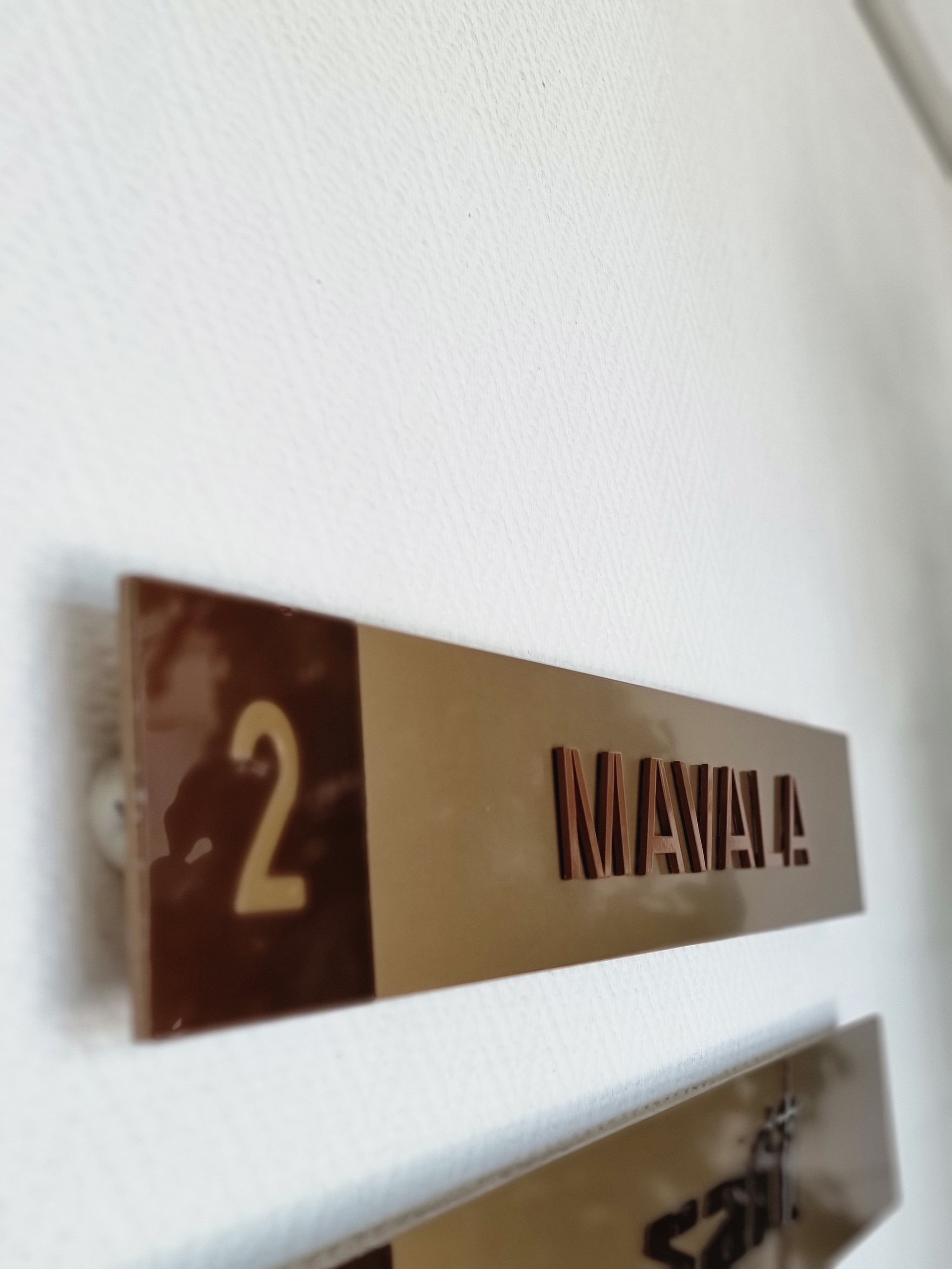 Aperçu Genève Signalétique Réalisation publicitaire gravure marquage murs