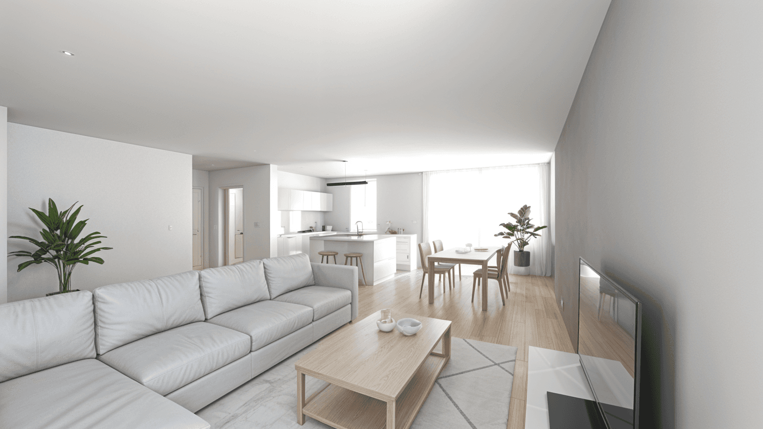 Bright open-plan living room with neutral decor, a sectional sofa, and a wooden coffee table, seamlessly connected to the kitchen and dining area.