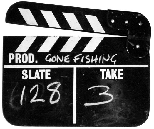 A black and white film clapper.