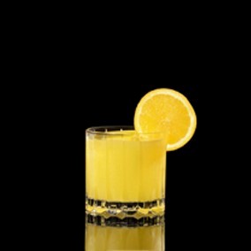 A closeup of a Screwdriver drink against a dark background.