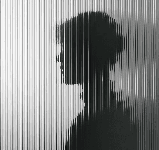 A faint silhouette of a person's head against a black background.