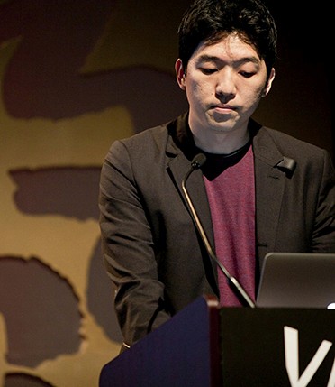 portrait of a man giving a speech