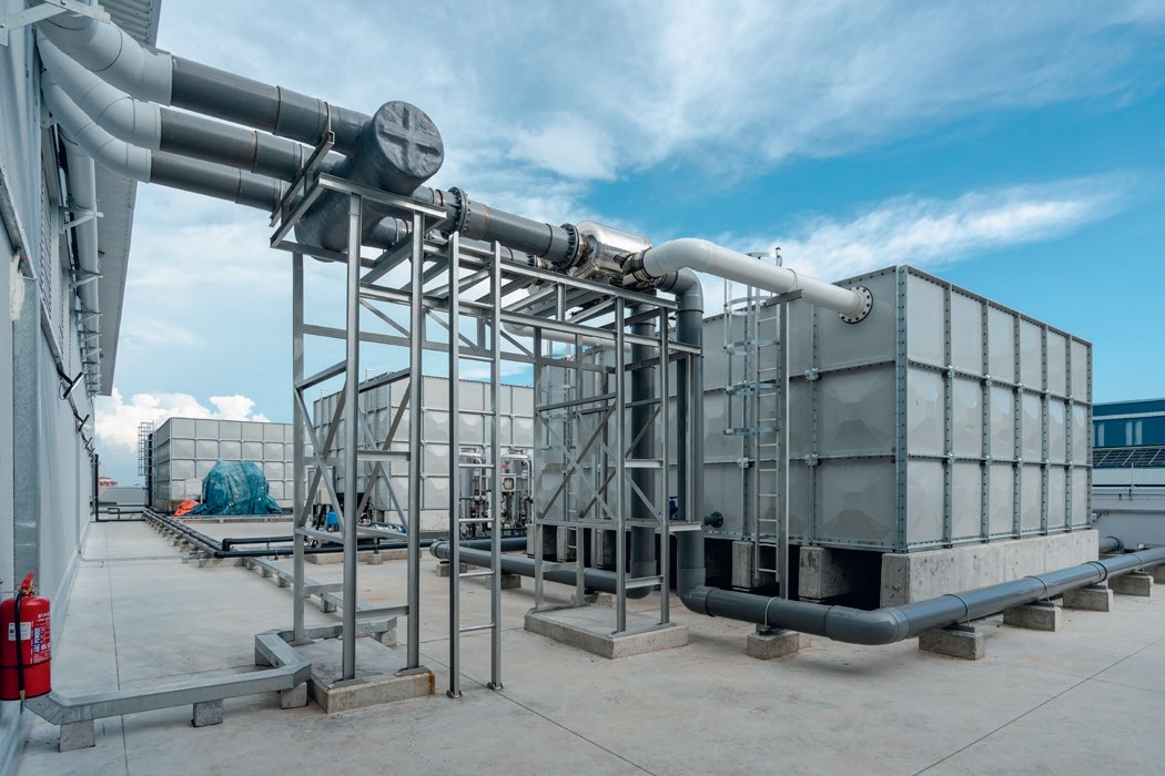 Mechanical equipment at  Koa Denko Factory & Office project by Asima Architects