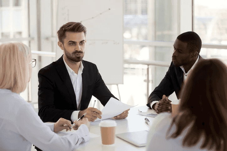 Image of a field sales representative pitching a product 