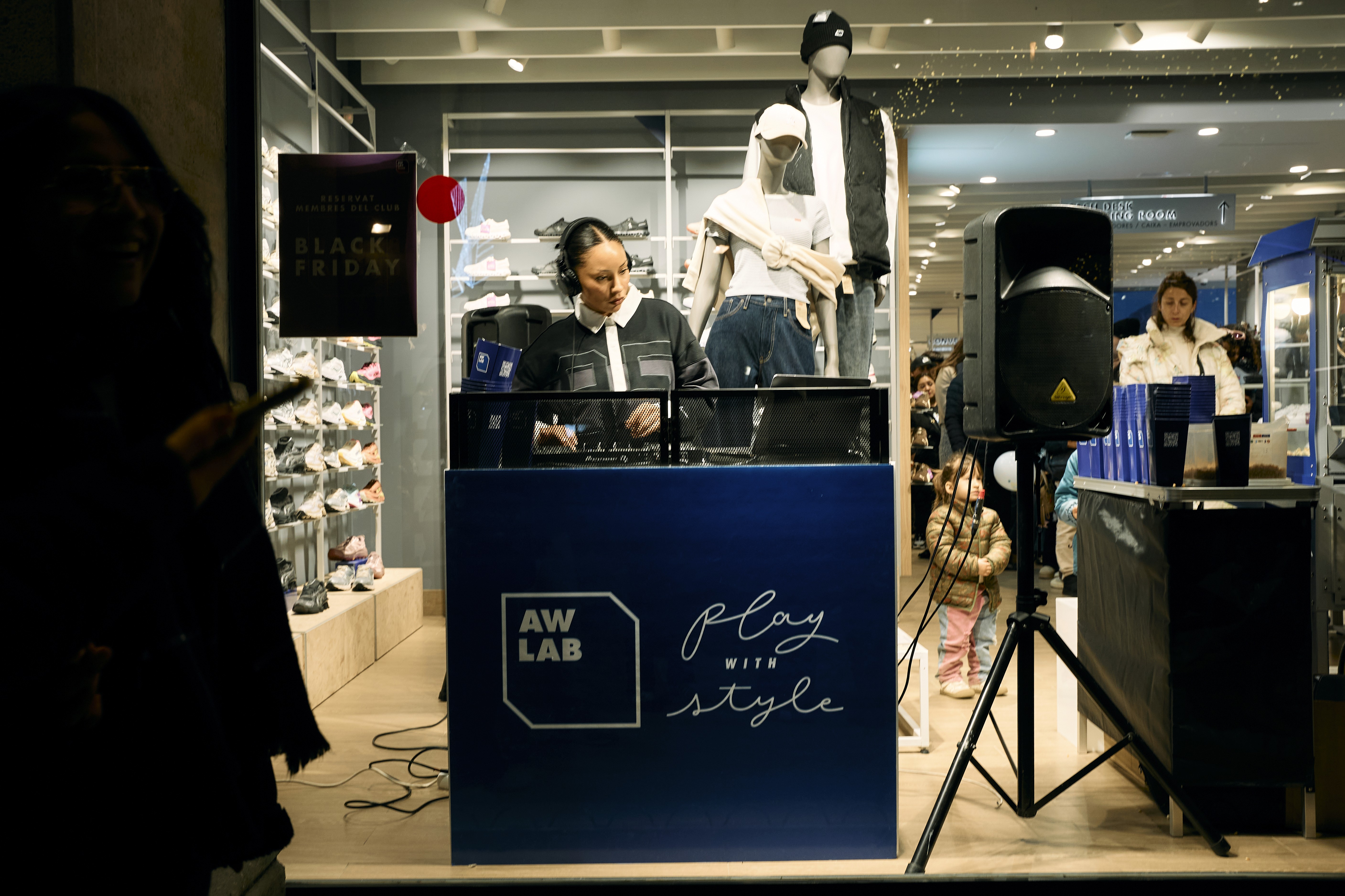 Streetside billboard with flyposters of the Batch.Works brand and illustrations