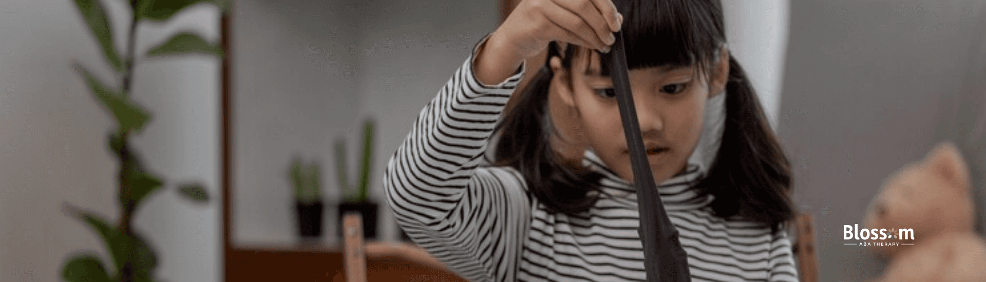 A little girl playing with slime