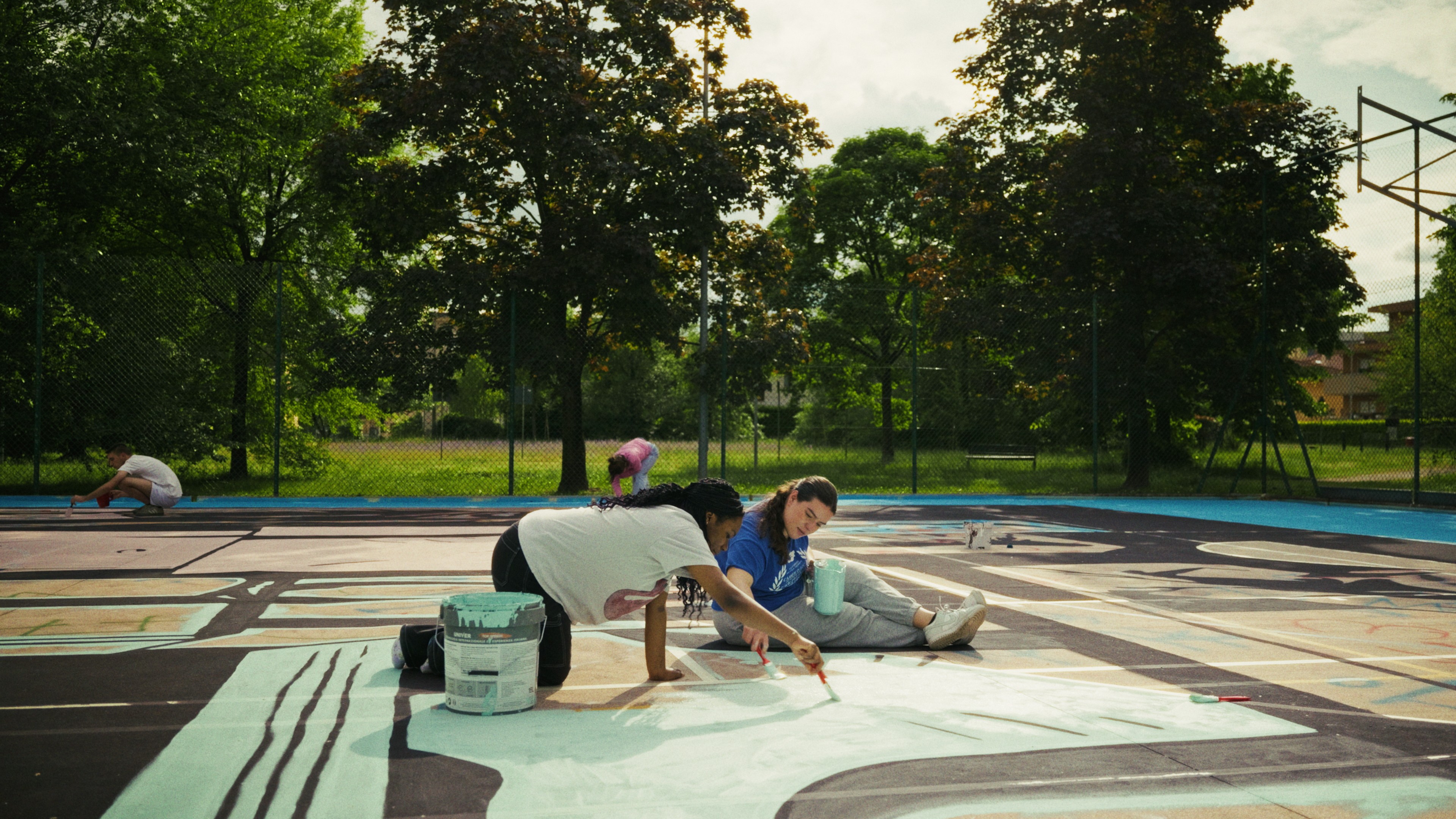 Team members in an office setting having a discussion, representing clear communication throughout the project process.