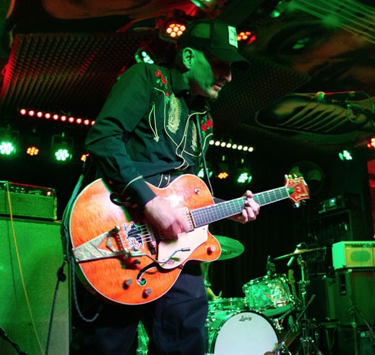 Donny Campion shreading on guitar at the Messer Chups show at Moes Alley.