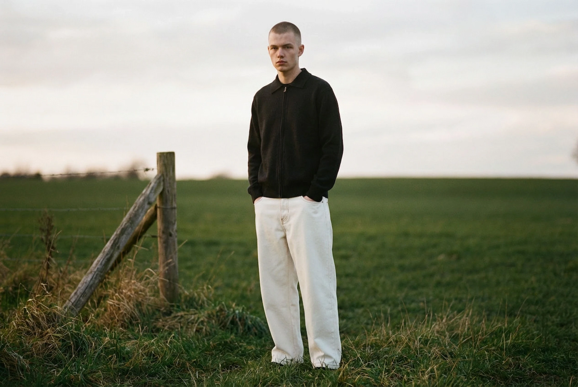 a blurry photo of a person standing in front of a window