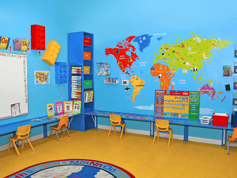 Preschool classroom featuring a colorful world map and interactive learning environment at Little Adventures Academy in Scottsdale, Arizona.
