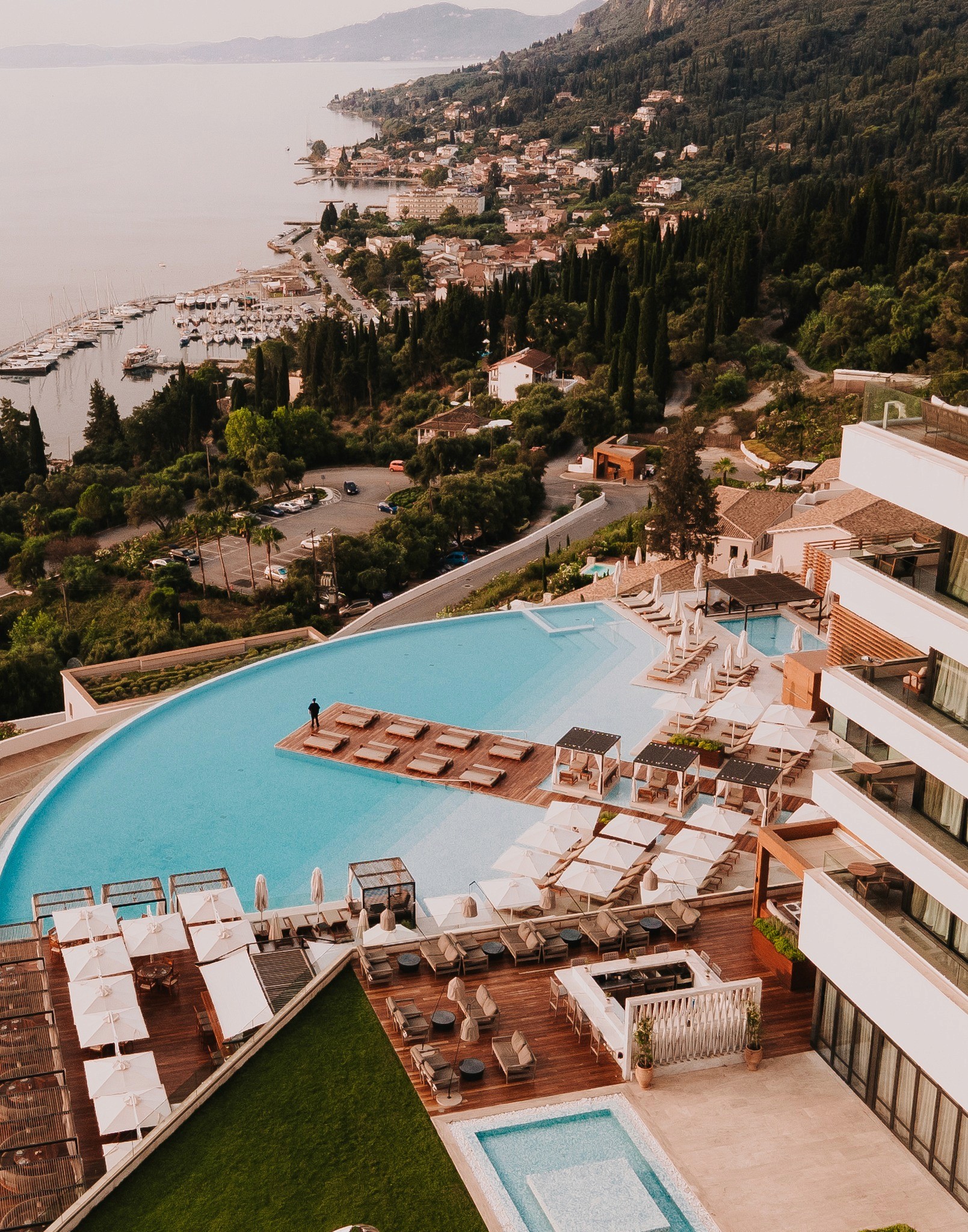 Cozy sleeping bed high in the mountain with a sunset view