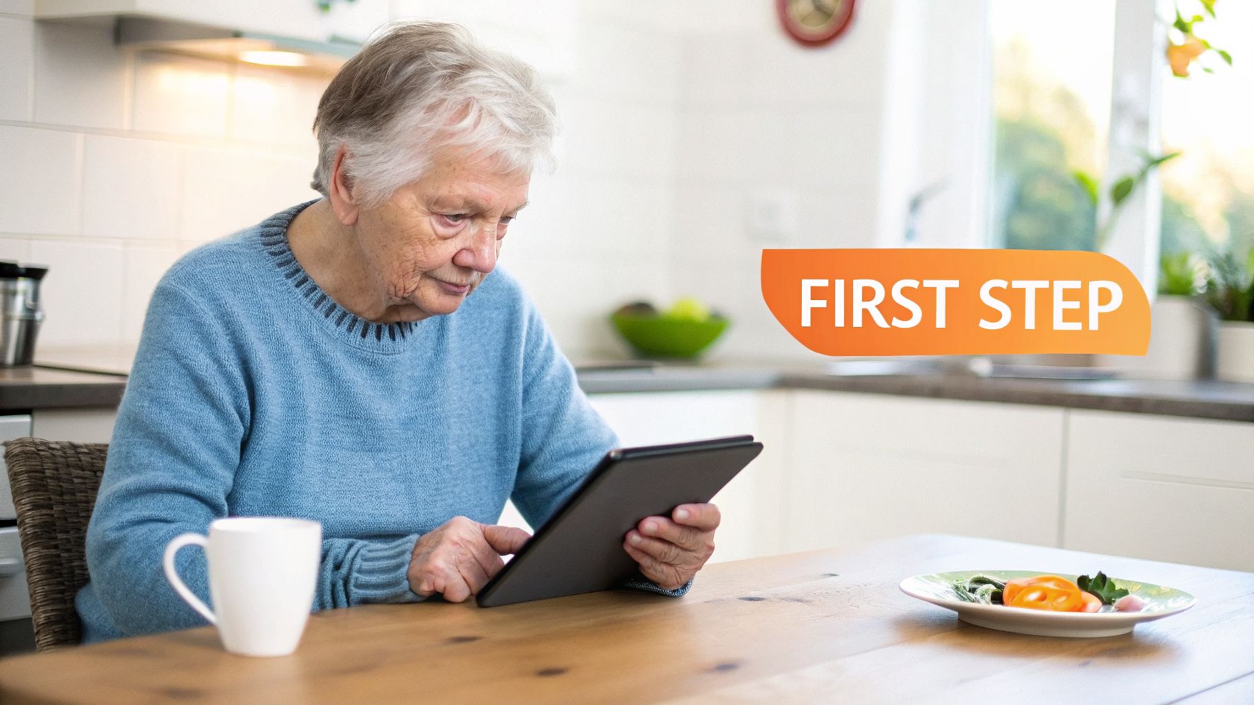An elderly woman intently uses a digital tablet at a wooden table in a bright kitchen, with 'FIRST STEP' text.