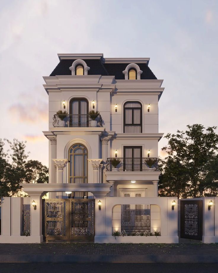 Modern indoor space with large glass doors, lush greenery, and a cozy seating area visible beyond.