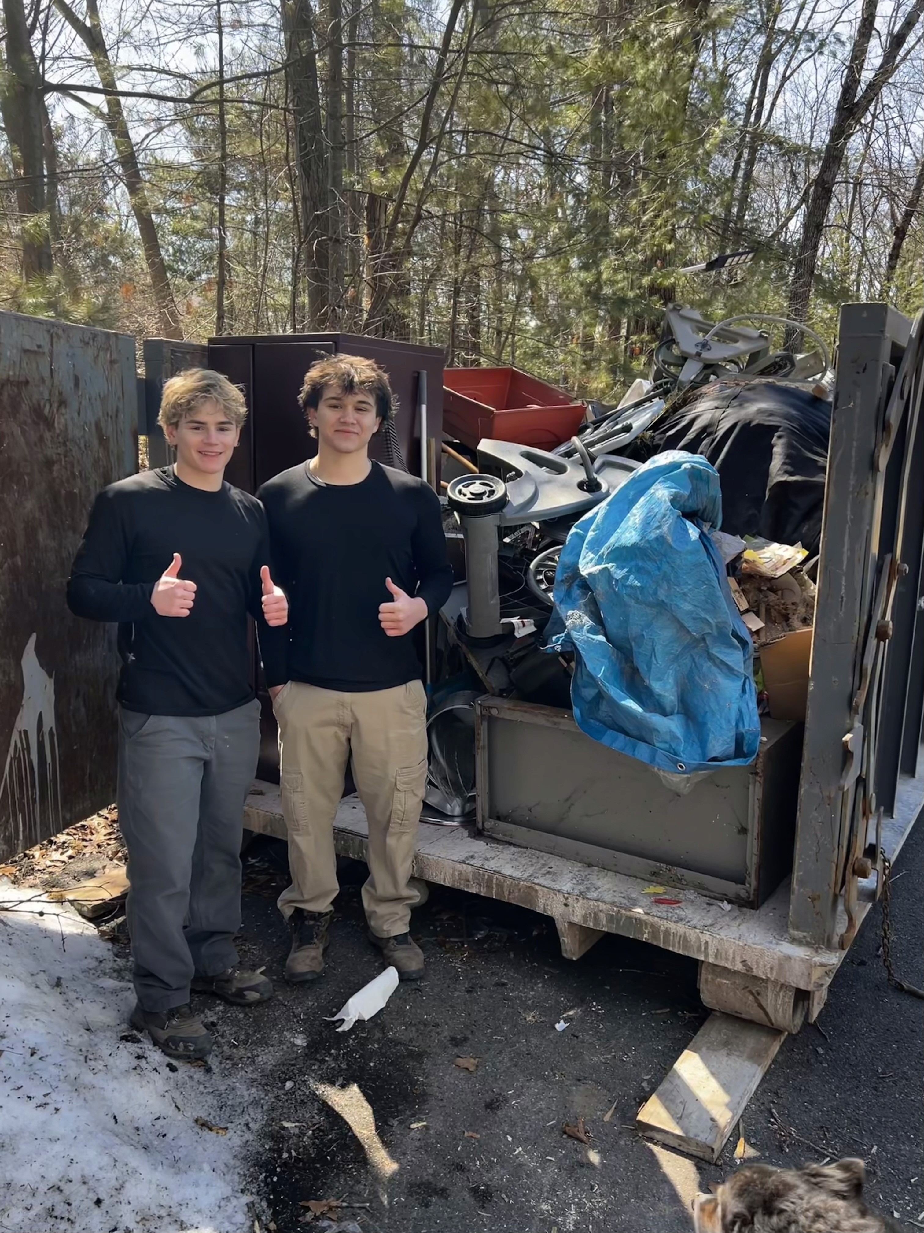 Bee-Gone Junk Removal crew hauling junk in Marlborough MA