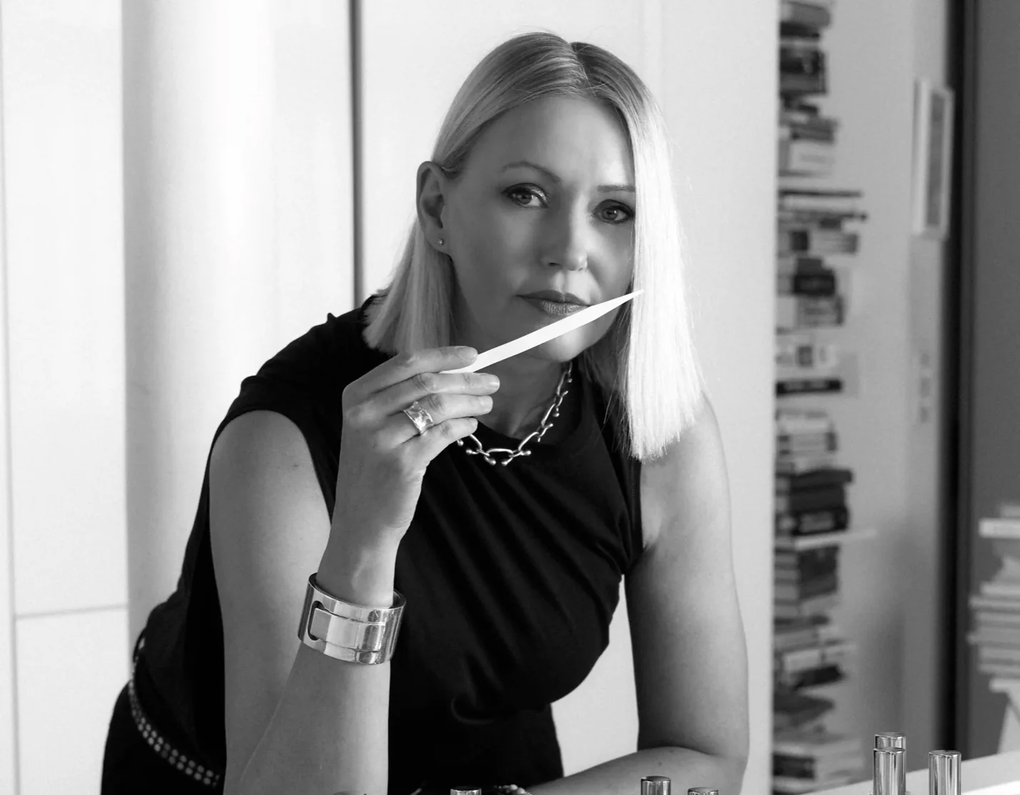 Co-founder Tess Richards testing fragrance at a lab table