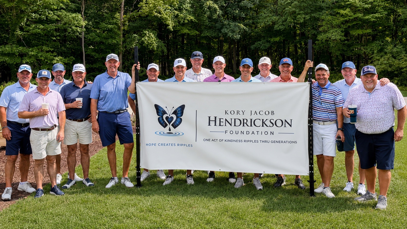 Golfers with the Kory Jacob Hendrickson Foundation banner at Canyata Golf Club