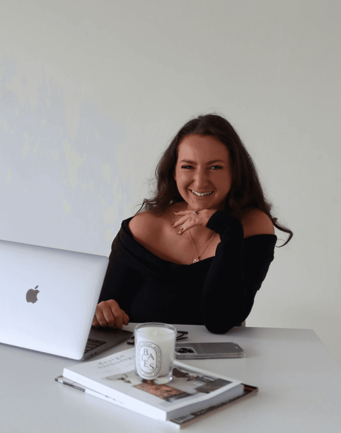 A woman channeling Reiki energy to another woman lying peacefully in front of her, fostering a sense of deep relaxation and healing.