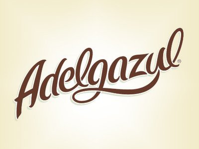 Rustic cabin in a golden field at sunset