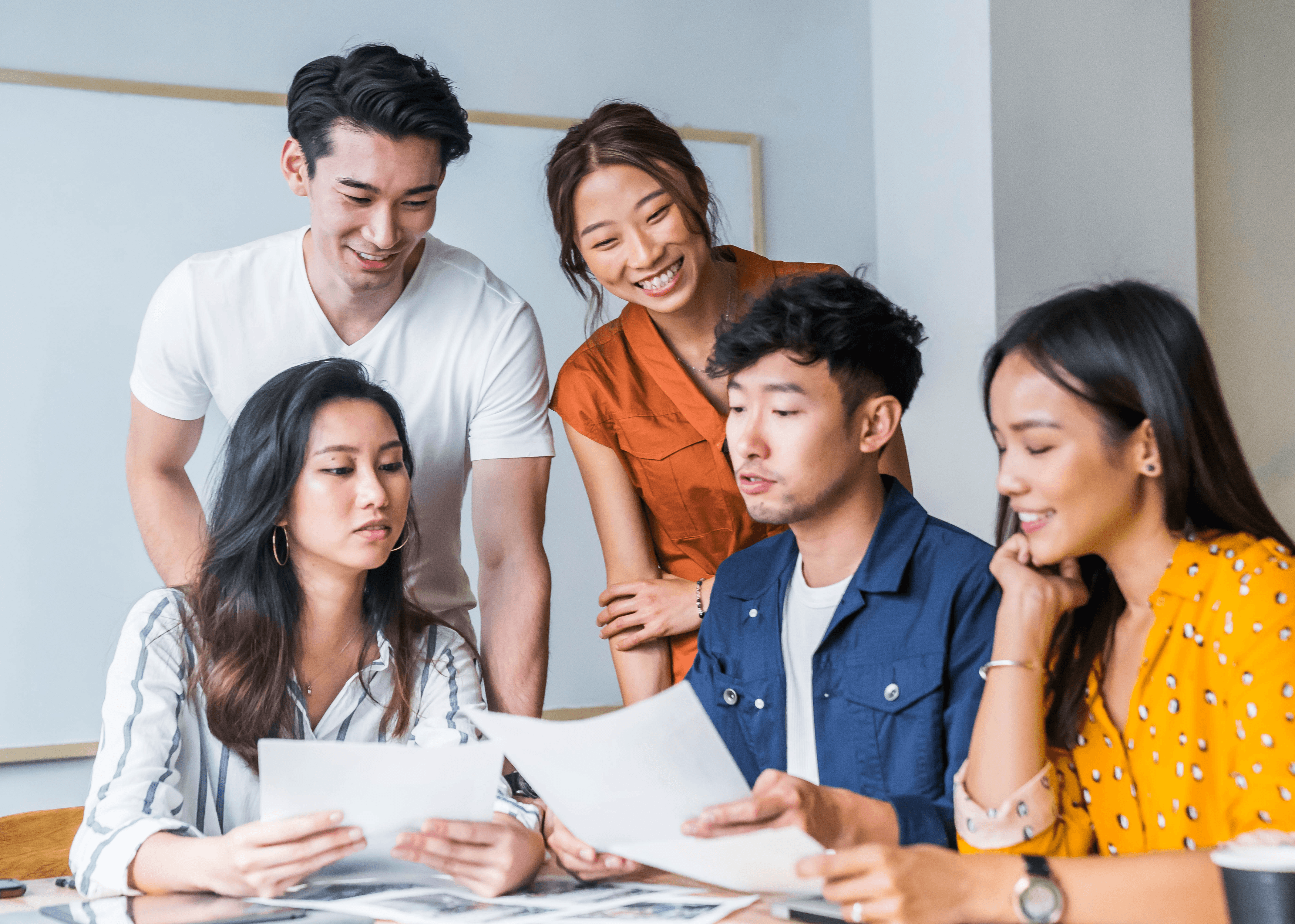Group of people using laptop