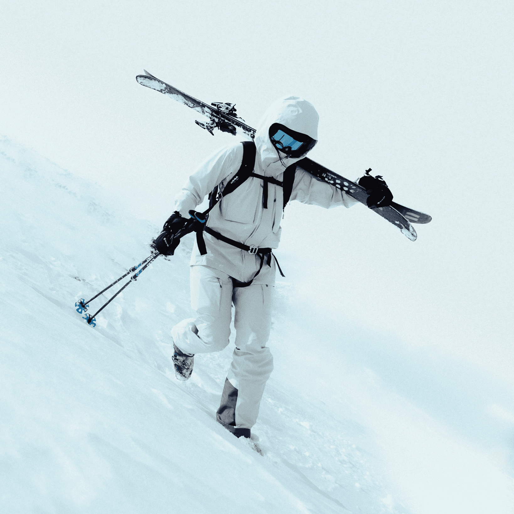 picture of a woman traversing a slope with her skis.
