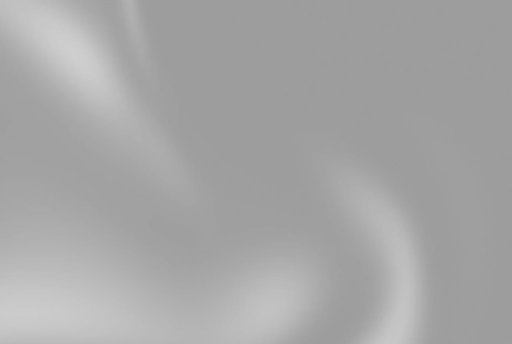 Soft gray abstract background with gentle light and shadow.