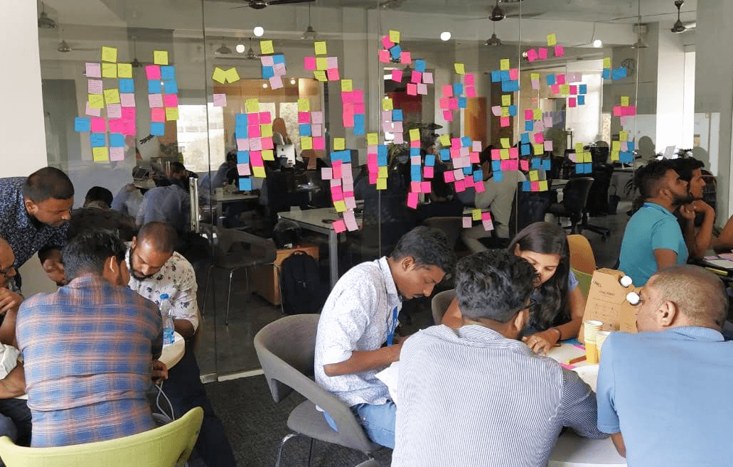 Speaker Presenting at Conference with Audience