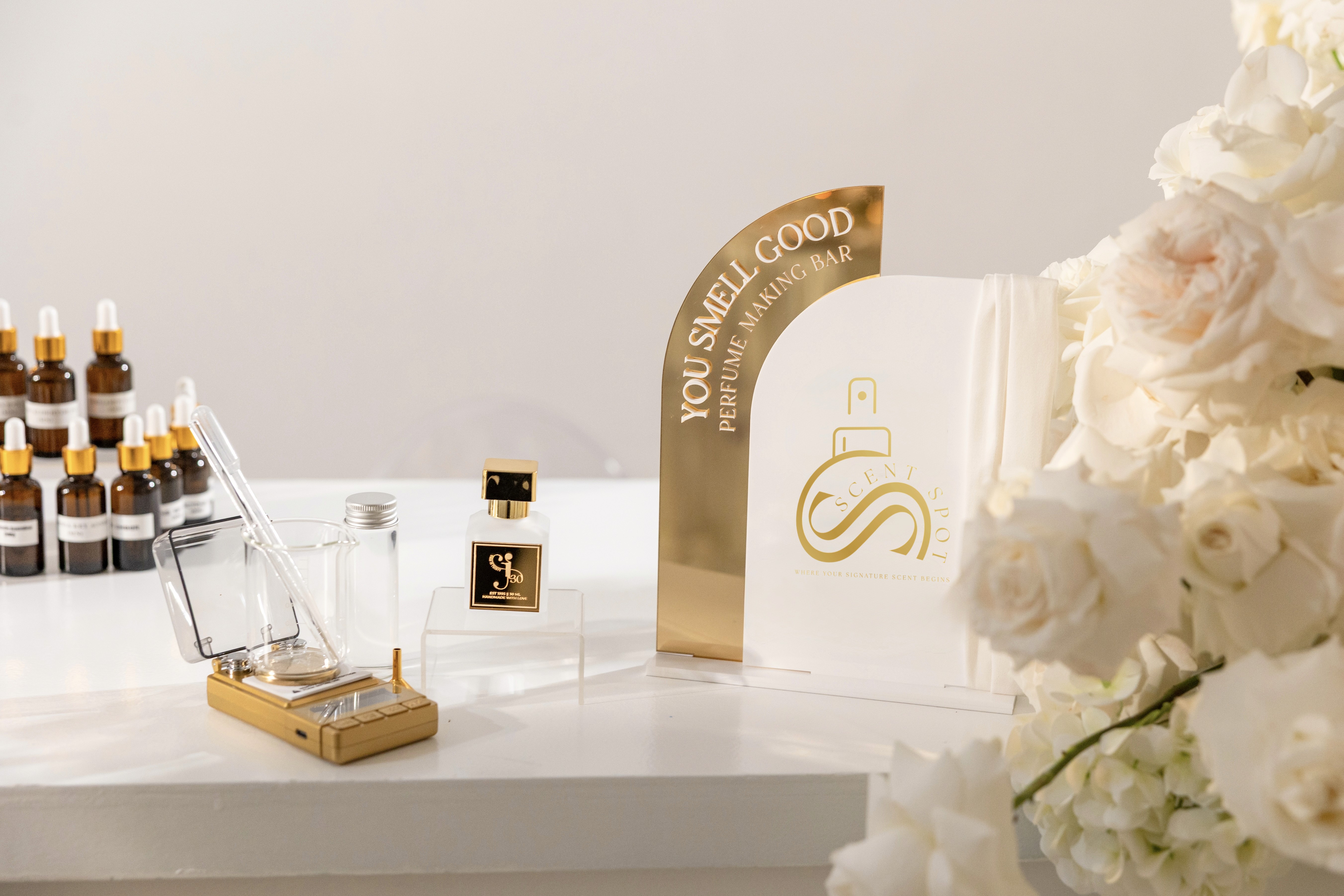 person holding amber glass bottle