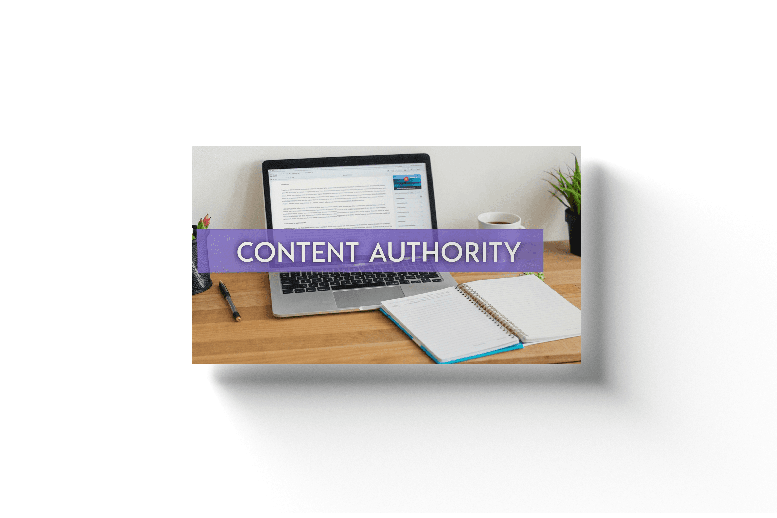 a laptop and notebook on a wooden desk with text 'content authority' in the foreground