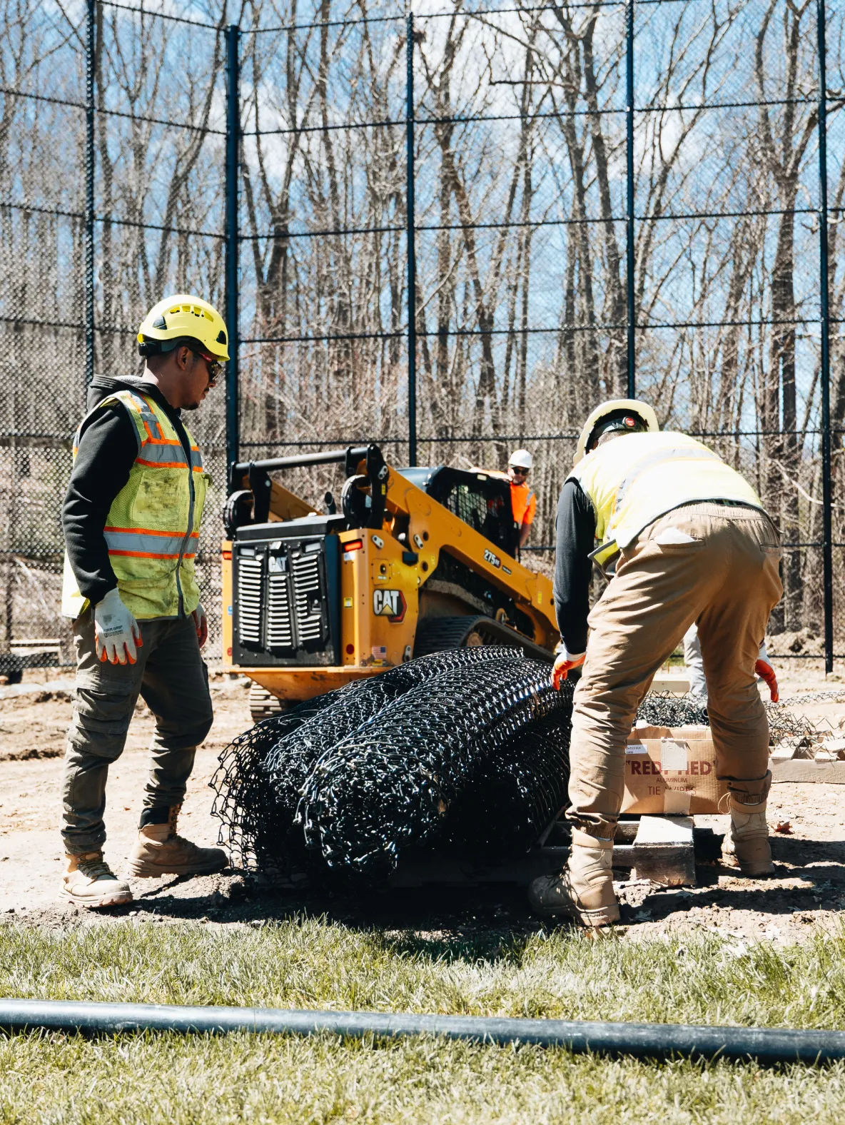 Price Landscape and Construction onsite working at a baseball field