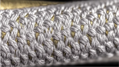 Close-up texture of durable, woven synthetic textile fibres.