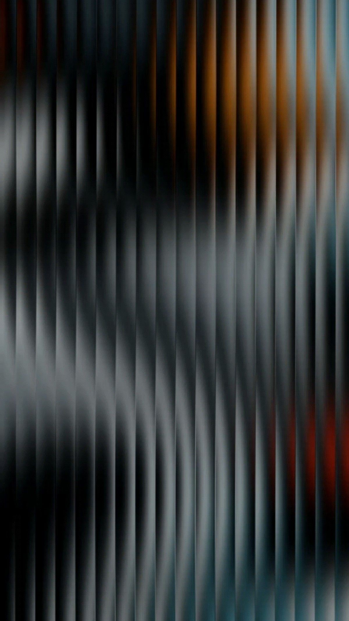 Colleagues reviewing documents and laptop data to improve conversion strategy.