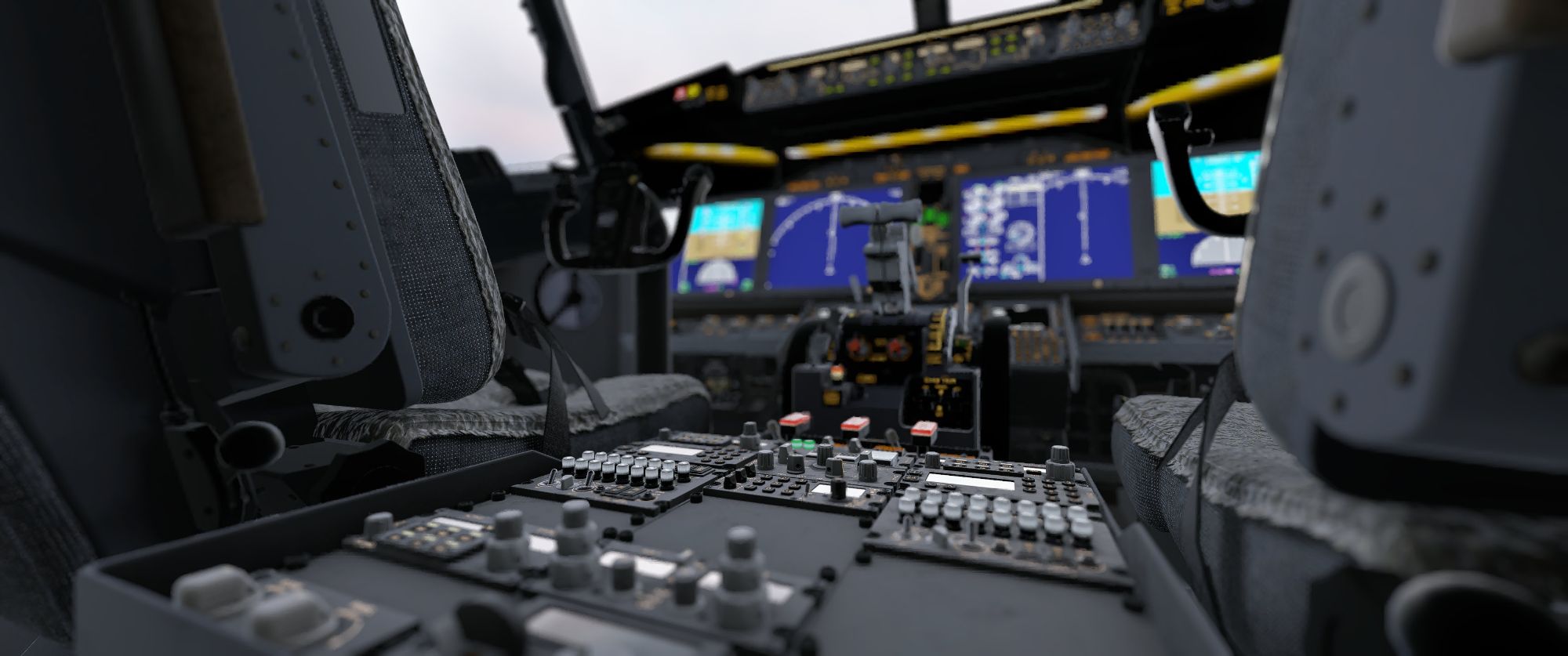 Interior view of the AFL 737 MAX cockpit with textured seats, pedestal, and main panel displays