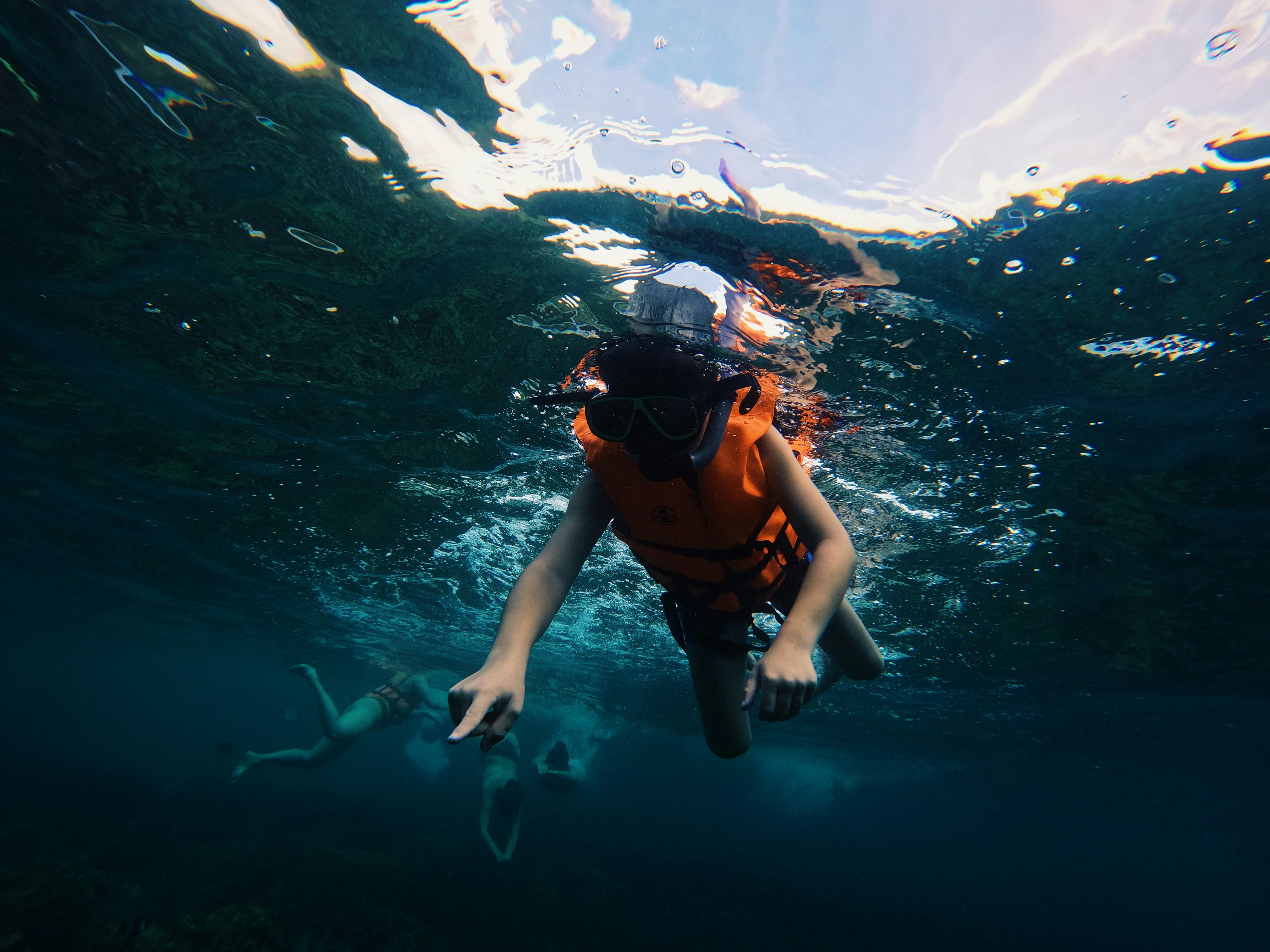 A child snorkeling