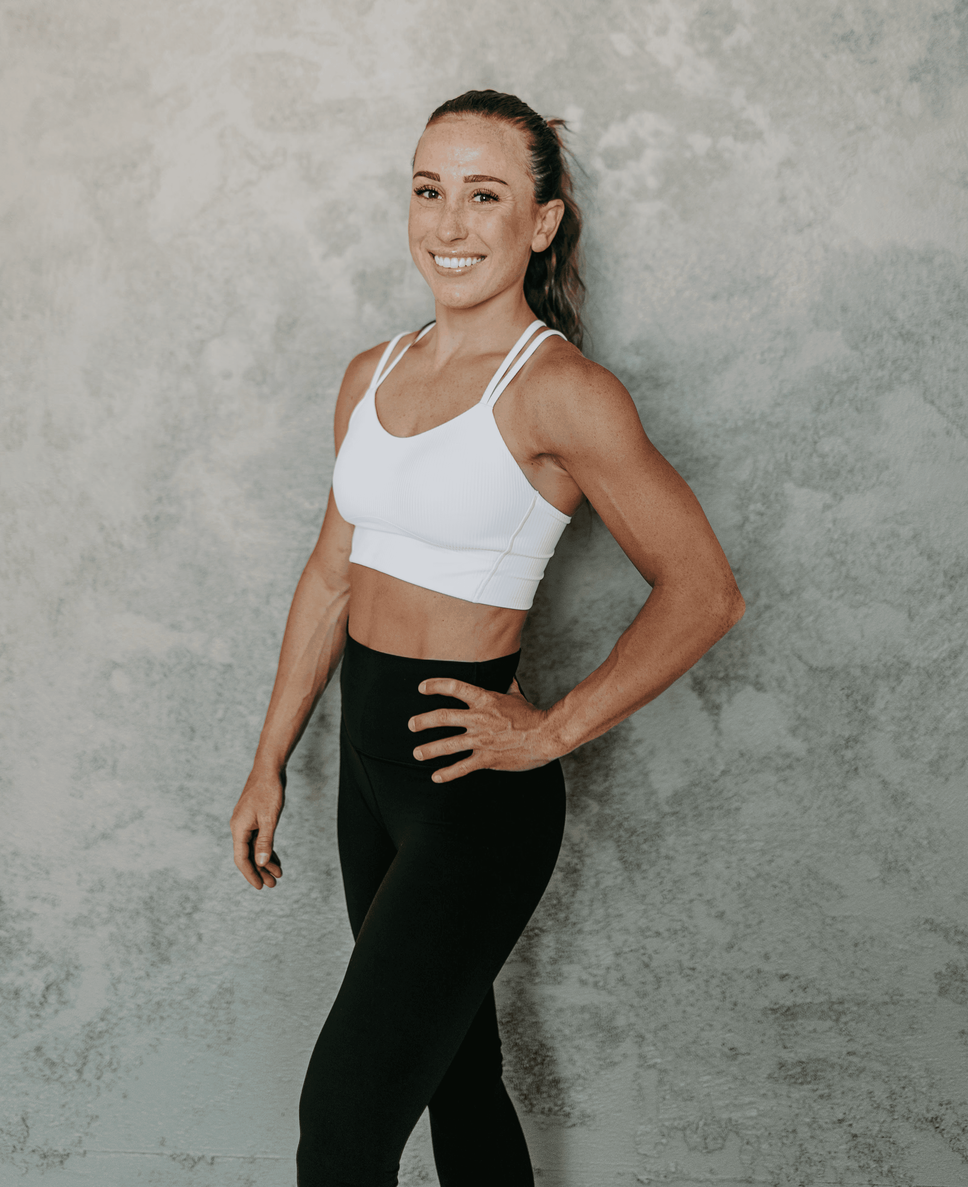 A person preparing for strength training in a gym setting, focusing on workout intensity, repetition tracking, and physical progress through a clean, motivational environment.