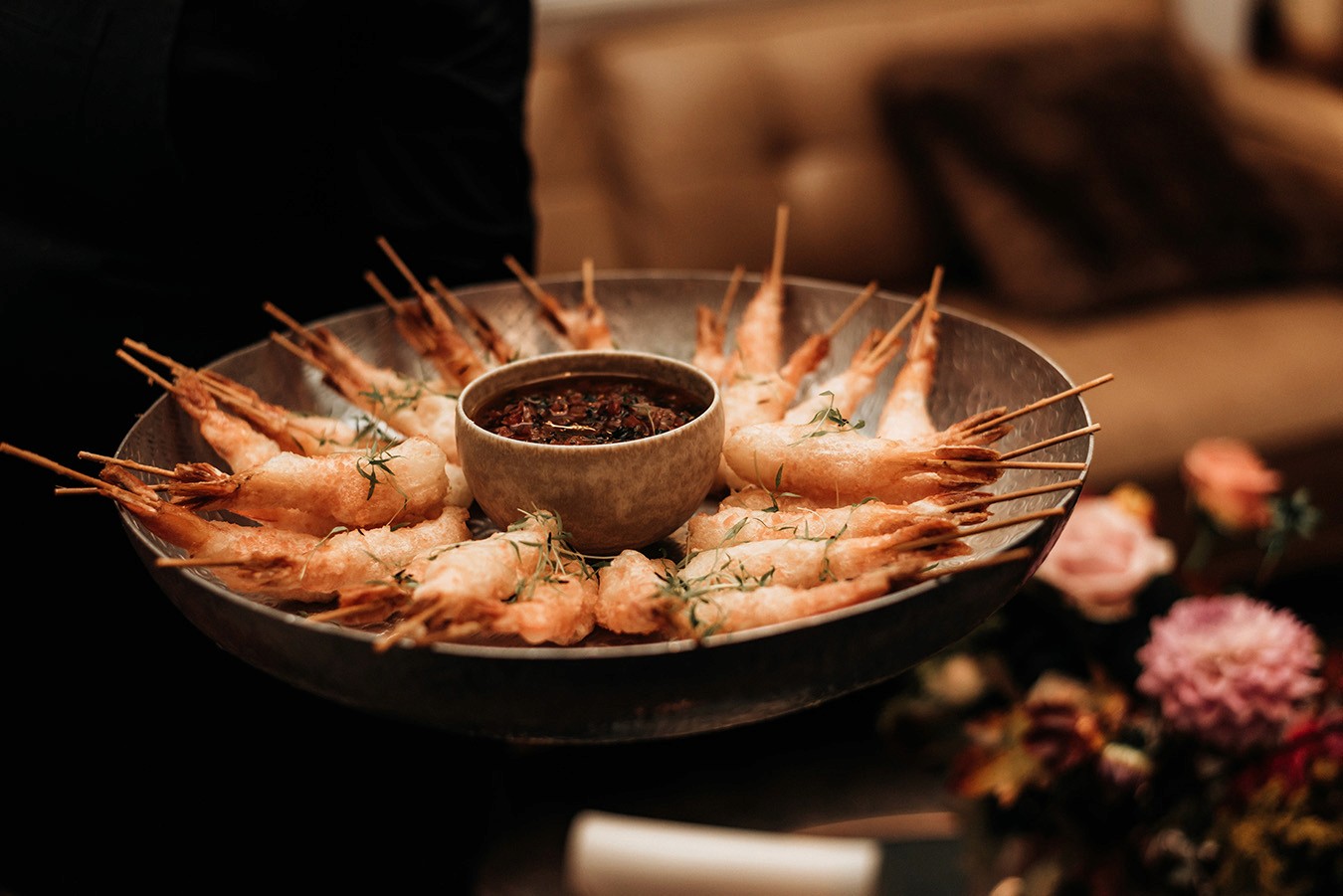 Tempura Prawn Canapes being served to guests