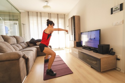 Woman working out at home.